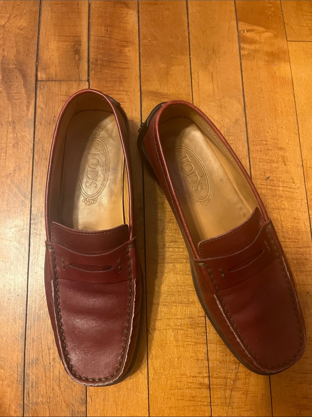 Tod's Burgundy Leather Penny Loafers